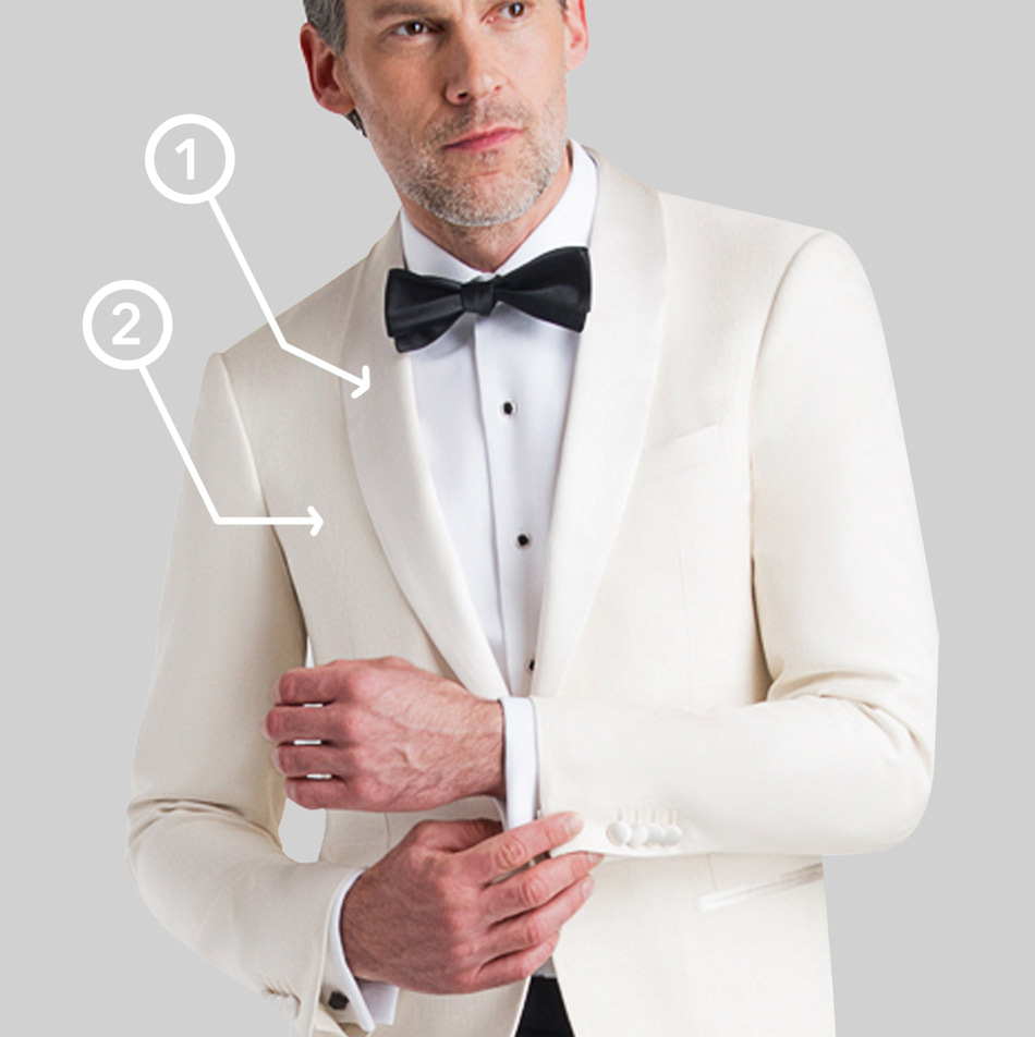 man wearing white tuxedo jacket and black bowtie with white numbered arrows pointing to the lapel