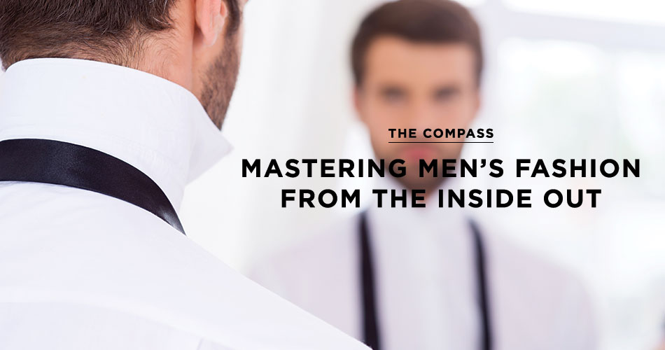 man wearing a white dress shirt with the collar popped up and a black tie around his neck looking at a reflection of himself with text "the compass. mastering men's fashion from the inside out"