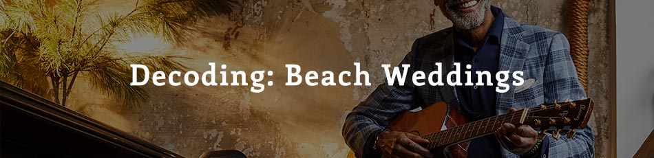 man wearing a blue checked blazer playing a guitar with text overlay "decoding: beach weddings"