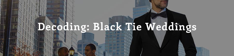 man wearing black tux with a bowtie in the city with text overlay "decoding: black tie weddings"