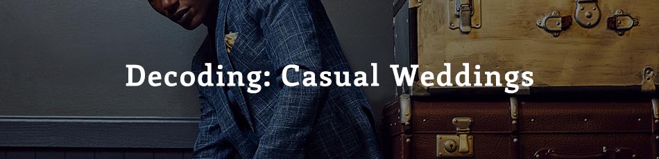 man wearing a blue suit leaning against old fashioned suitcases with text overlay "decoding: casual weddings"