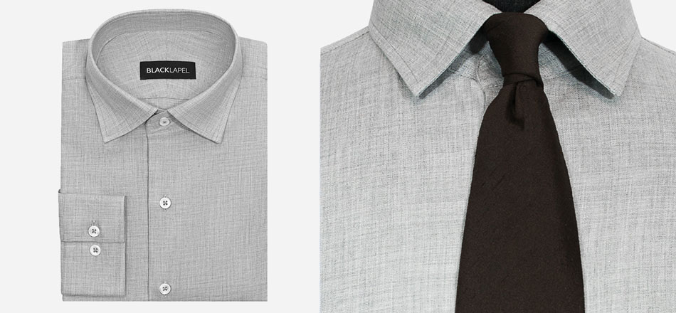 folded gray shirt with a close up of brown tie