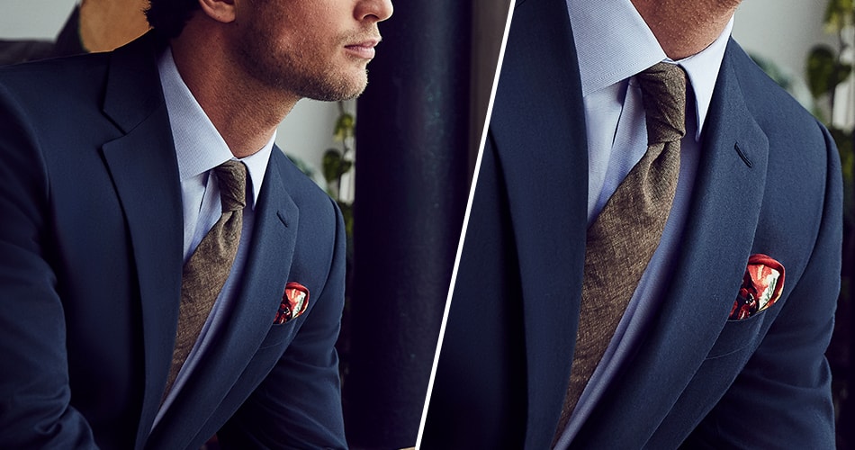 brown suit with red pocket square
