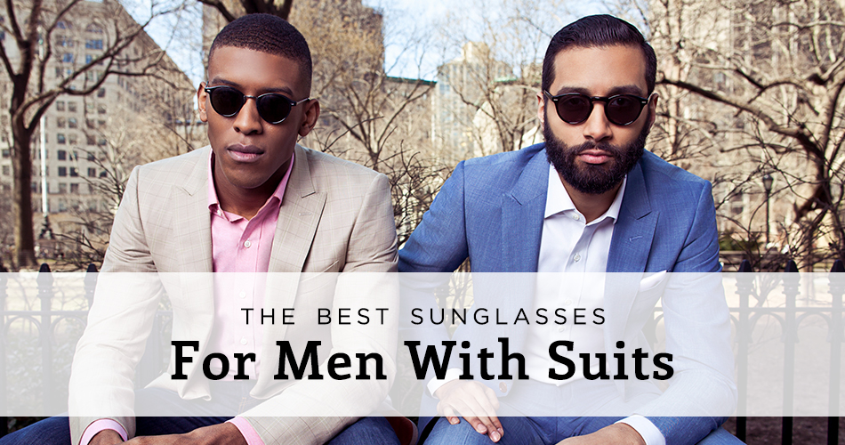 two men with suits and sunglasses