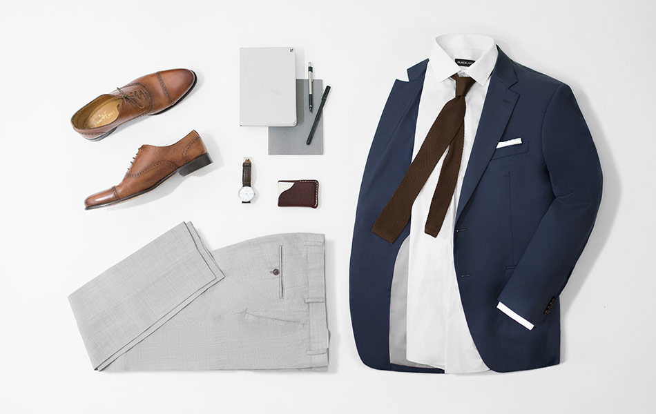 navy sports coat with gray pants