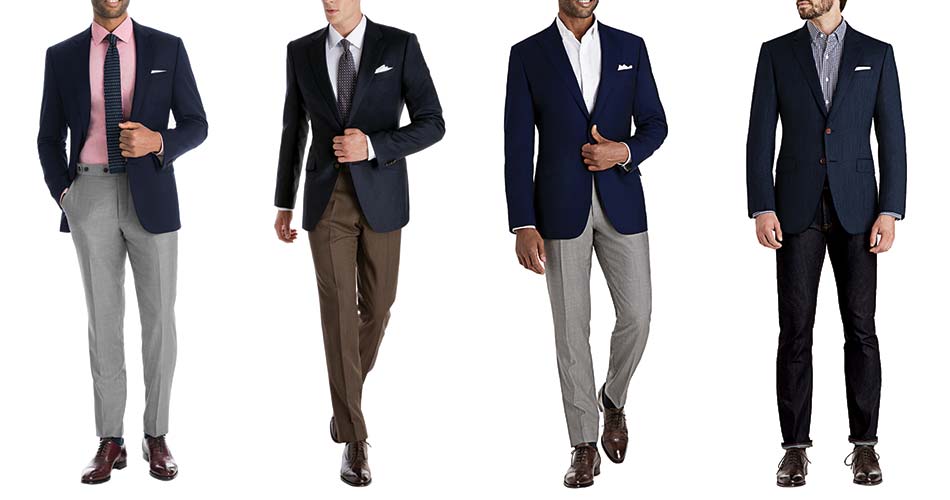 four men wearing navy blazers with different colored pants
