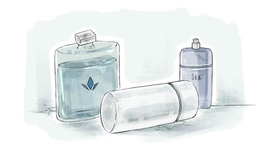 three different cologne bottles on a light blue background
