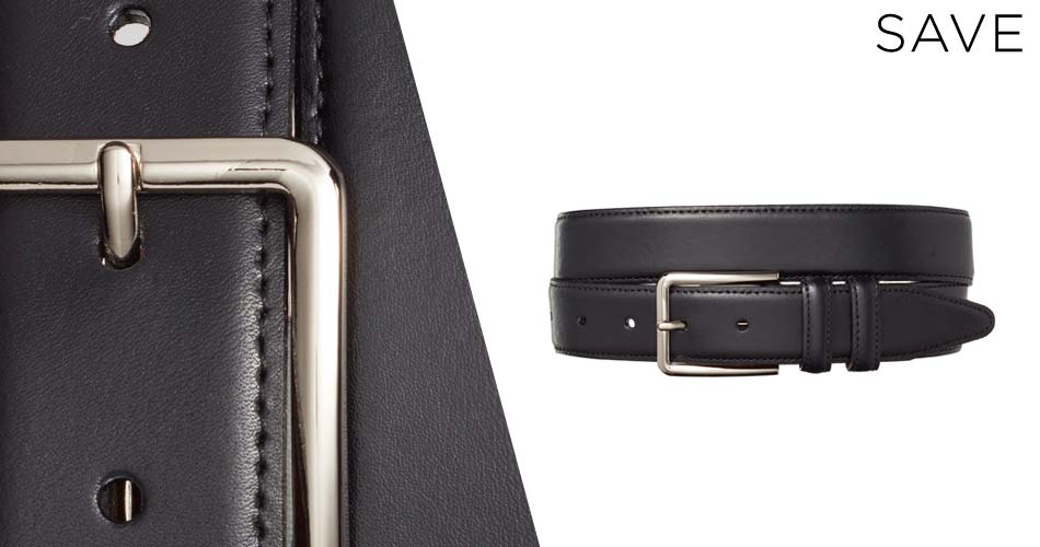 suit accessory black leather belt with silver buckle close up and on white background