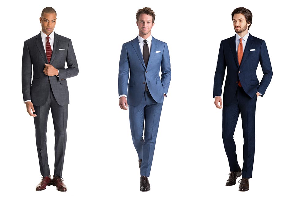 left to right: man wearing a gray suit, man wearing blue suit, man wearing navy suit