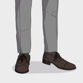 crop of man's legs wearing gray dress pants and brown dress shoes