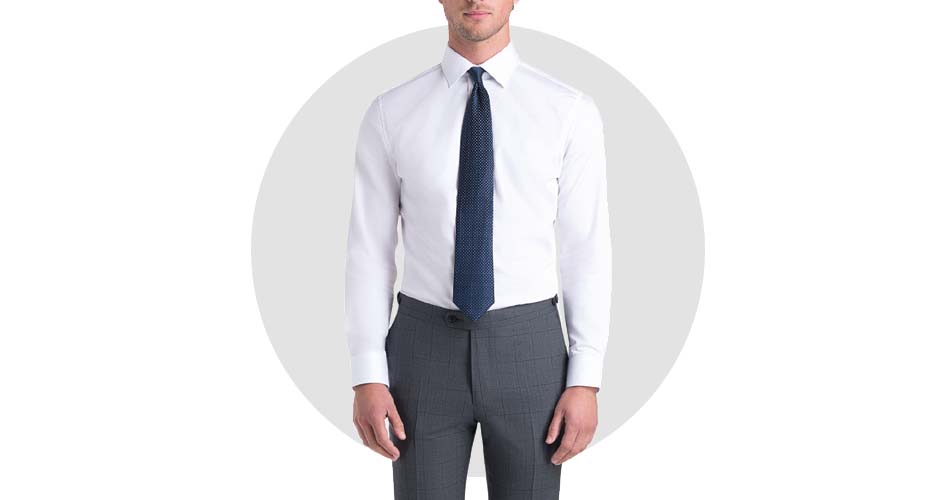 man wearing flat front gray dress pants