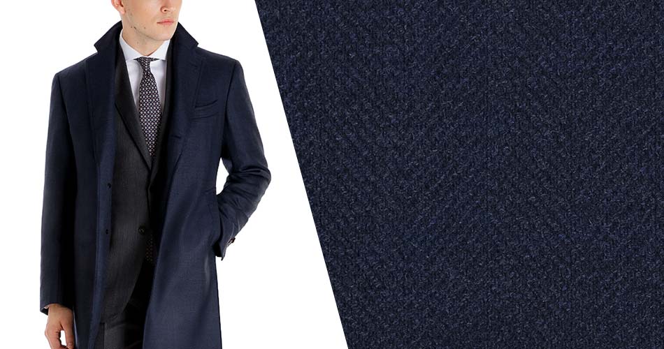 man wearing navy wool topcoat with wool swatch