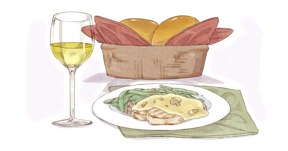 glass of chardonnay wine for beginners with cream chicken dish