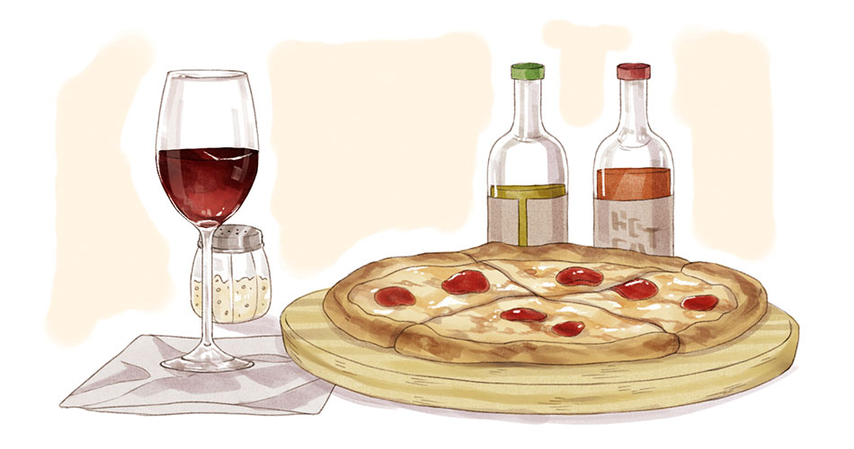 glass of merlot wine for beginners with personal pizza dish